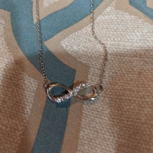Silver infinity symbol with CZ and fine chain